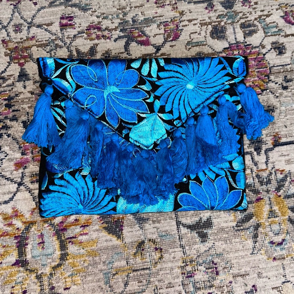 Embroider blue clutch